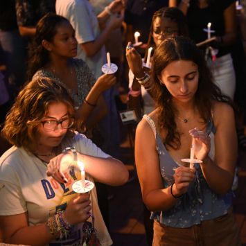 Emory students holding candles