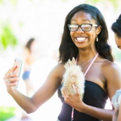 Emory student taking a selfie with a rabbit